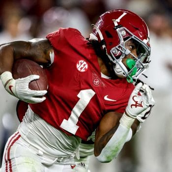 Jahmyr Gibbs powers forward for Alabama, running with the shiftiness that made him a 7v7 football standout.