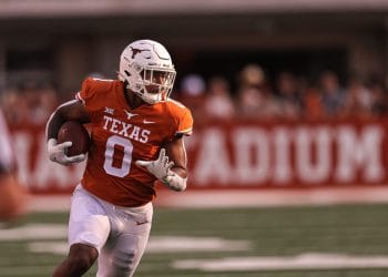 Texas tight end Ja’Tavion Sanders runs after the catch during a 2023 college football game in Austin.
