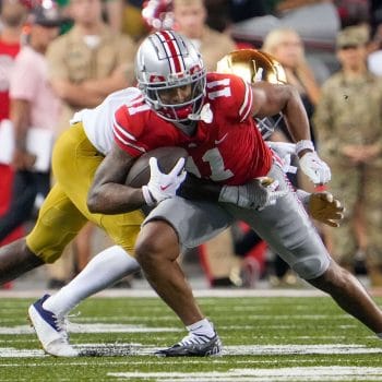 Ohio State wide receiver Jaxon Smith-Njigba breaks a tackle after a catch.