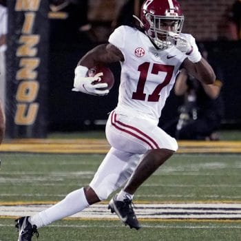 Jaylen Waddle accelerates down the sideline after a catch for Alabama.