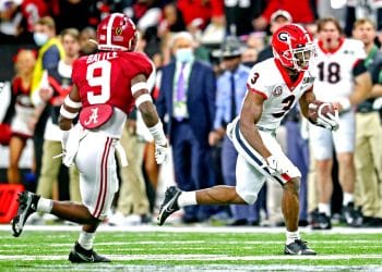 Jordan Battle tracks George Pickens after a catch during the national championship game between Alabama and Georgia