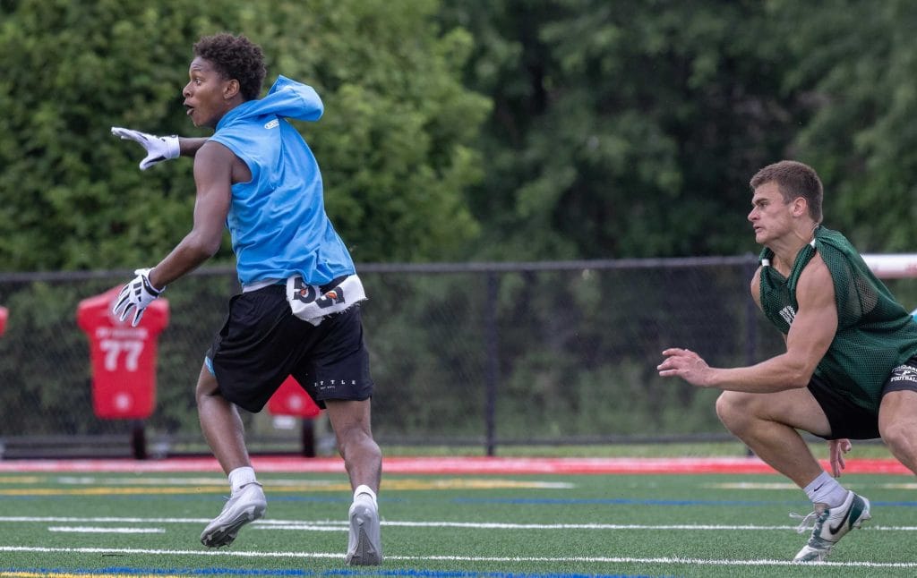 Jordan Glisson runs a route during 7v7 football tournament action at the Manalapan Recreation Complex in July 2024