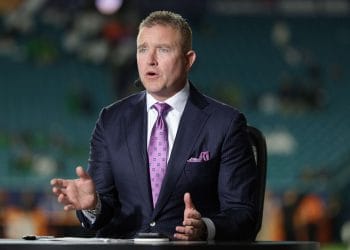 Kirk Herbstreit breaking down game action from the ESPN studio during a College Football Playoff broadcast