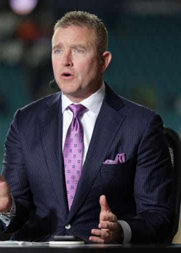 Kirk Herbstreit breaking down game action from the ESPN studio during a College Football Playoff broadcast