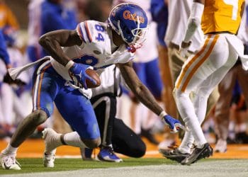 Kyle Pitts, one of the Top 10 Tight Ends Who Played 7v7 Football of All Time, makes a move on the sideline during a Florida vs. Tennessee game.