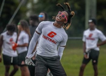 Malcolm Tucker celebrates after a play during a 7v7 football tournament at Keiser University in West Palm Beach