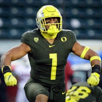 Noah Sewell flexes after a big play, featured in the Top 10 Linebackers Who Played 7v7 Football of All Time