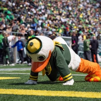 Duck mascot hyping up the Oregon football stadium crowd