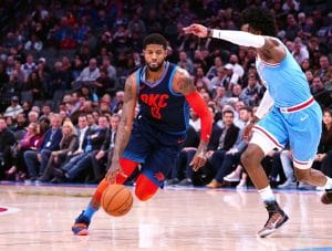 Paul George dribbles for the Oklahoma City Thunder against the Sacramento Kings