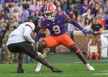 RJ Mickens prepares to make a tackle against a Louisville ball carrier during an ACC game