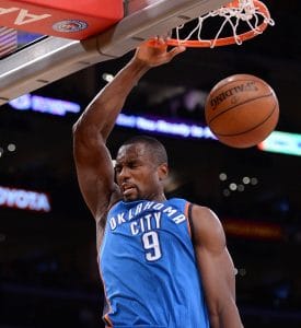 Serge Ibaka dunk wearing OKC blue jersey