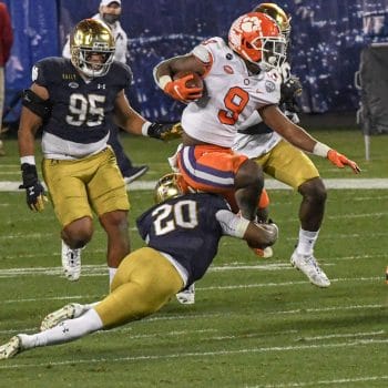 Travis Etienne breaks a tackle against Notre Dame, running with elite acceleration rooted in 7v7 football skills.