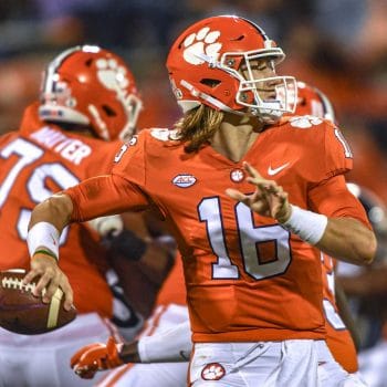 Trevor Lawrence drops back to pass during a Clemson football game in his college career coming in at #5 The Top 10 Quarterbacks Who Played 7v7 Football of All Time