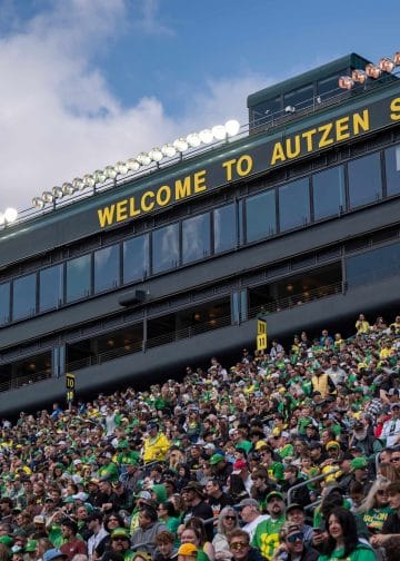 Fans packed below Autzen Stadium sign at the Oregon football stadium