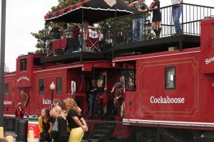 Fans gather outside Williams Brice Stadium at the iconic Cockaboose Railroad tailgate