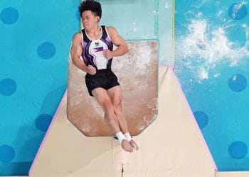 Carlos Yulo of the Philippines mid-air during his vault routine en route to winning gold at the Gymnastics Olympics in Paris 2024