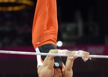 Epke Zonderland performing on high bar during the Artistic Gymnastics Olympics at London 2012.