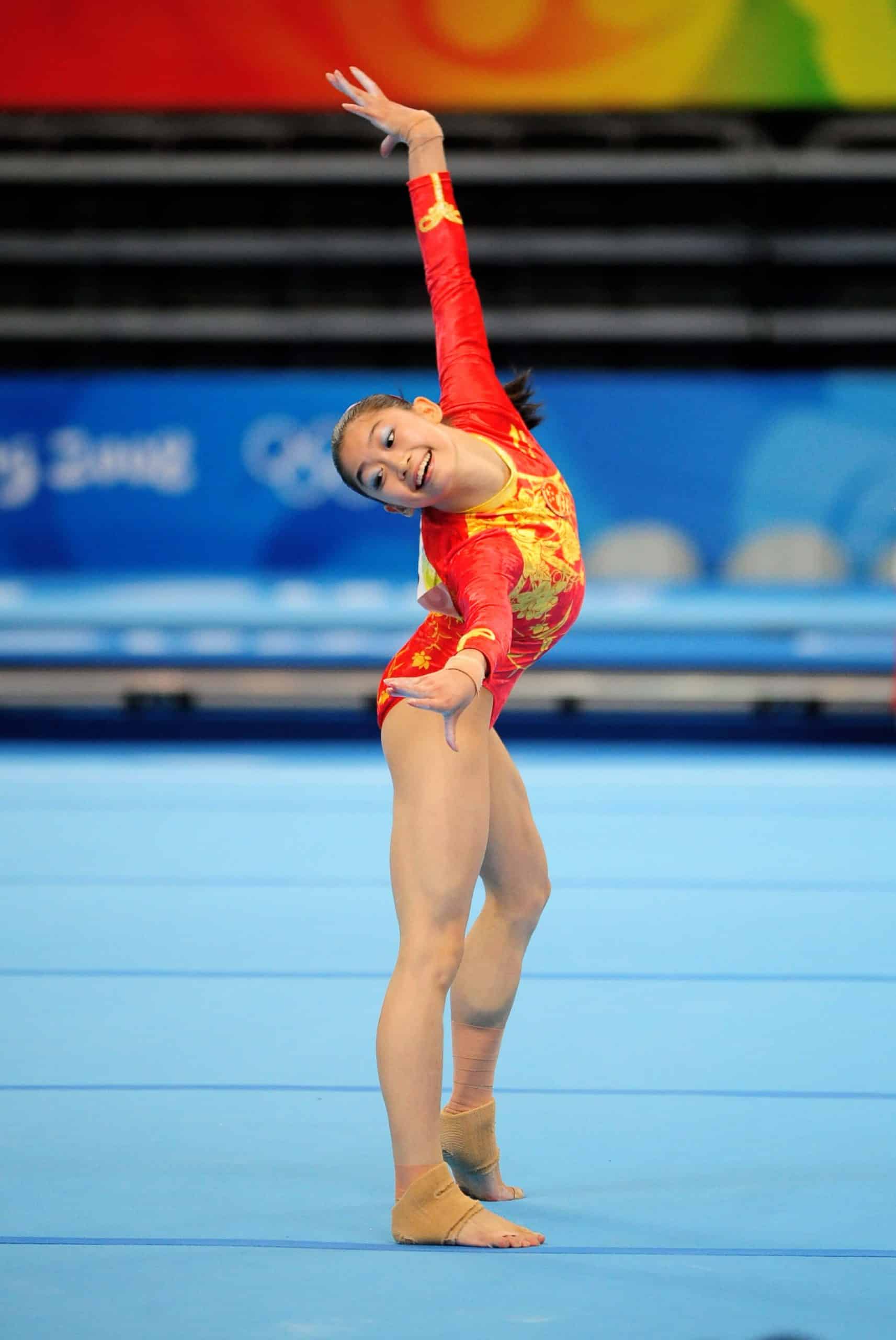 Jiang Yuyuan performing during her floor routine at the Olympics, one of the top Female Artistic Gymnastics Olympics Floor Routines ever
