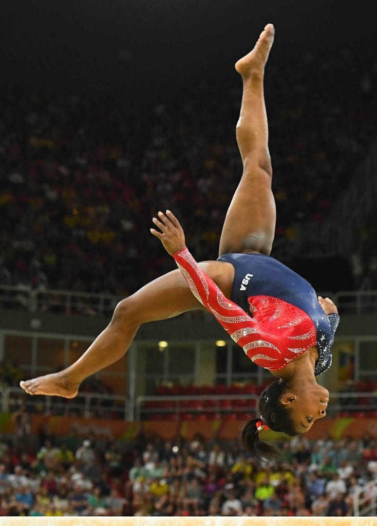 Simone Biles performs a beam routine during the artistic gymnastics Olympics Champions at Rio 2016